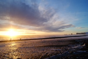 Sunset on the black sand beach, South Coast Tour